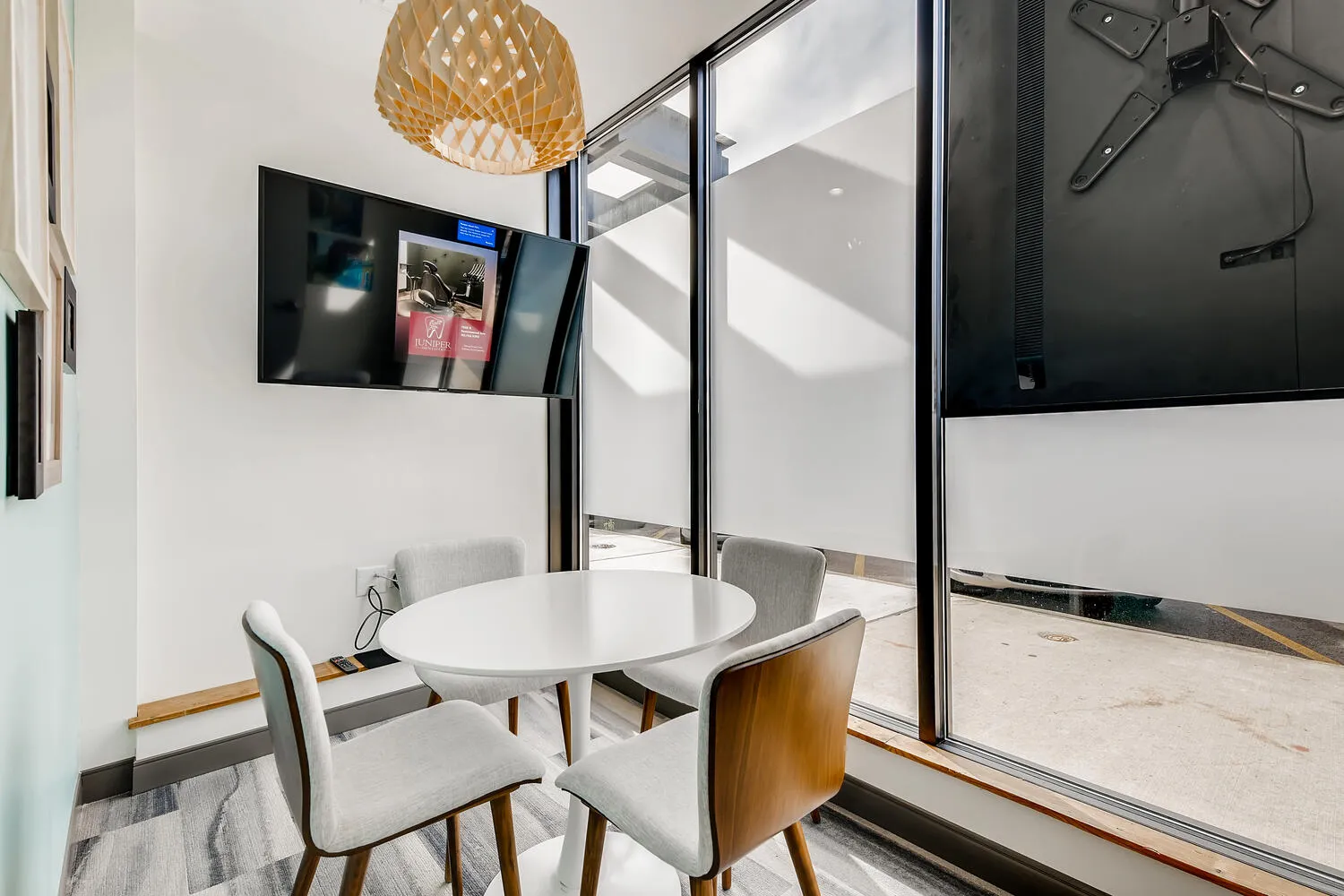 Modern dental treatment room with comfortable patient chair